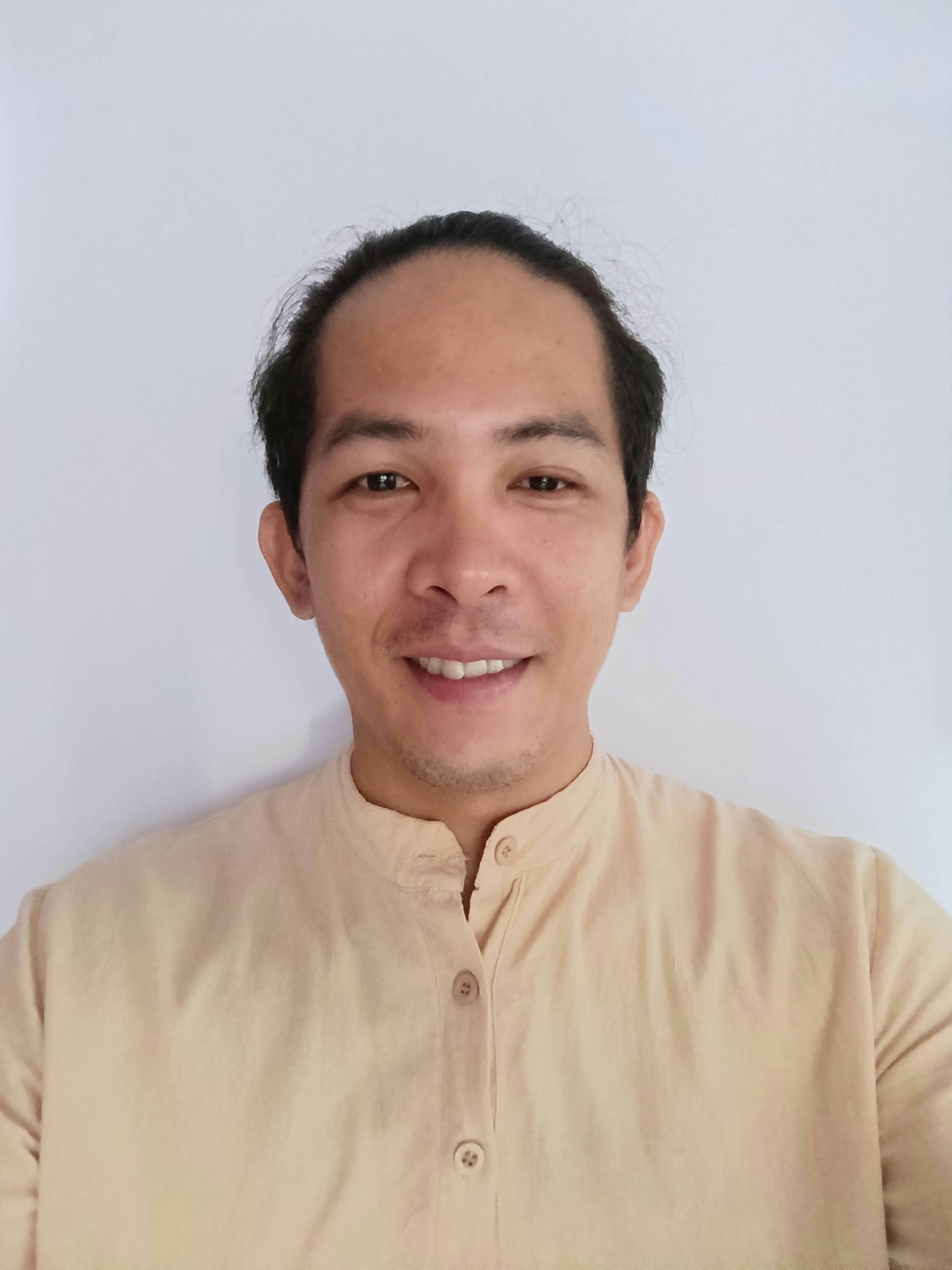 Portrait of CALA owner Chuckie Amihan.
